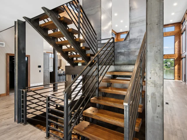 Entry and steel staircase at 88 Lakeview Court