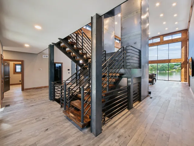 Entry and steel staircase at 88 Lakeview Court