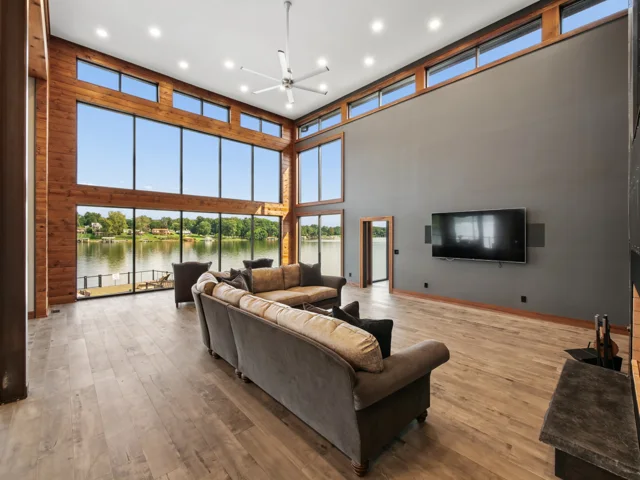 Great room and steel-wrapped fireplace at 88 Lakeview Court