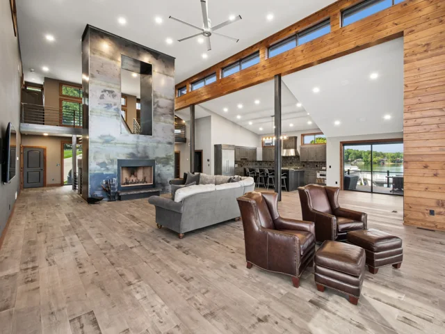Great room and steel-wrapped fireplace at 88 Lakeview Court