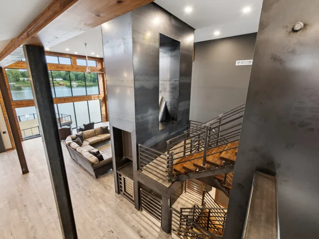 Steel staircase and lower level at 88 Lakeview Court