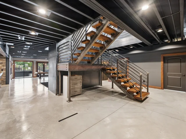 Steel staircase and lower level at 88 Lakeview Court