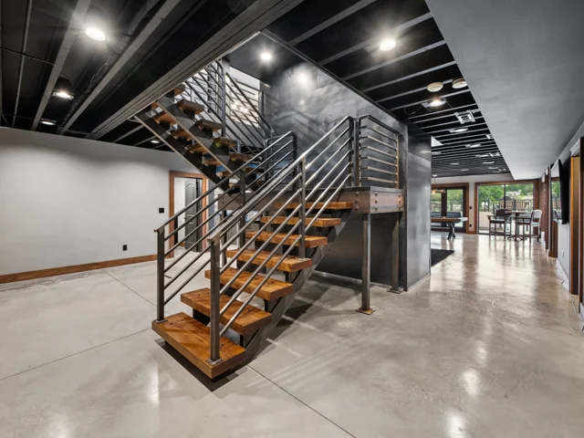 Steel staircase and lower level at 88 Lakeview Court