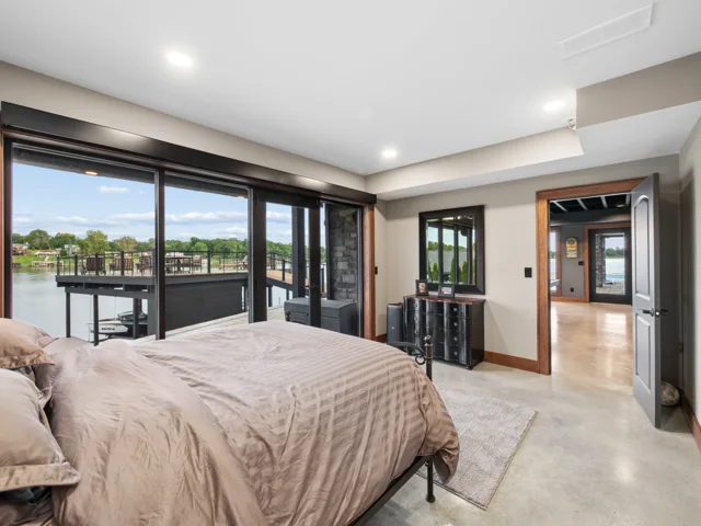 Lower-level lake-facing guest bedroom at 88 Lakeview Court