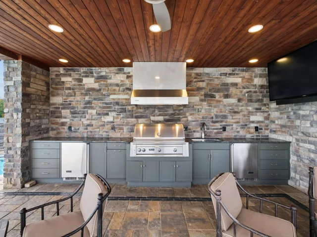 Outdoor kitchen and serving bar at 88 Lakeview Court