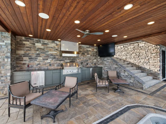 Outdoor kitchen and serving bar at 88 Lakeview Court
