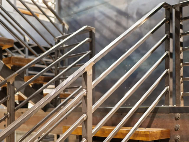 Fabricated steel railings and wood stair treads at 88 Lakeview Court